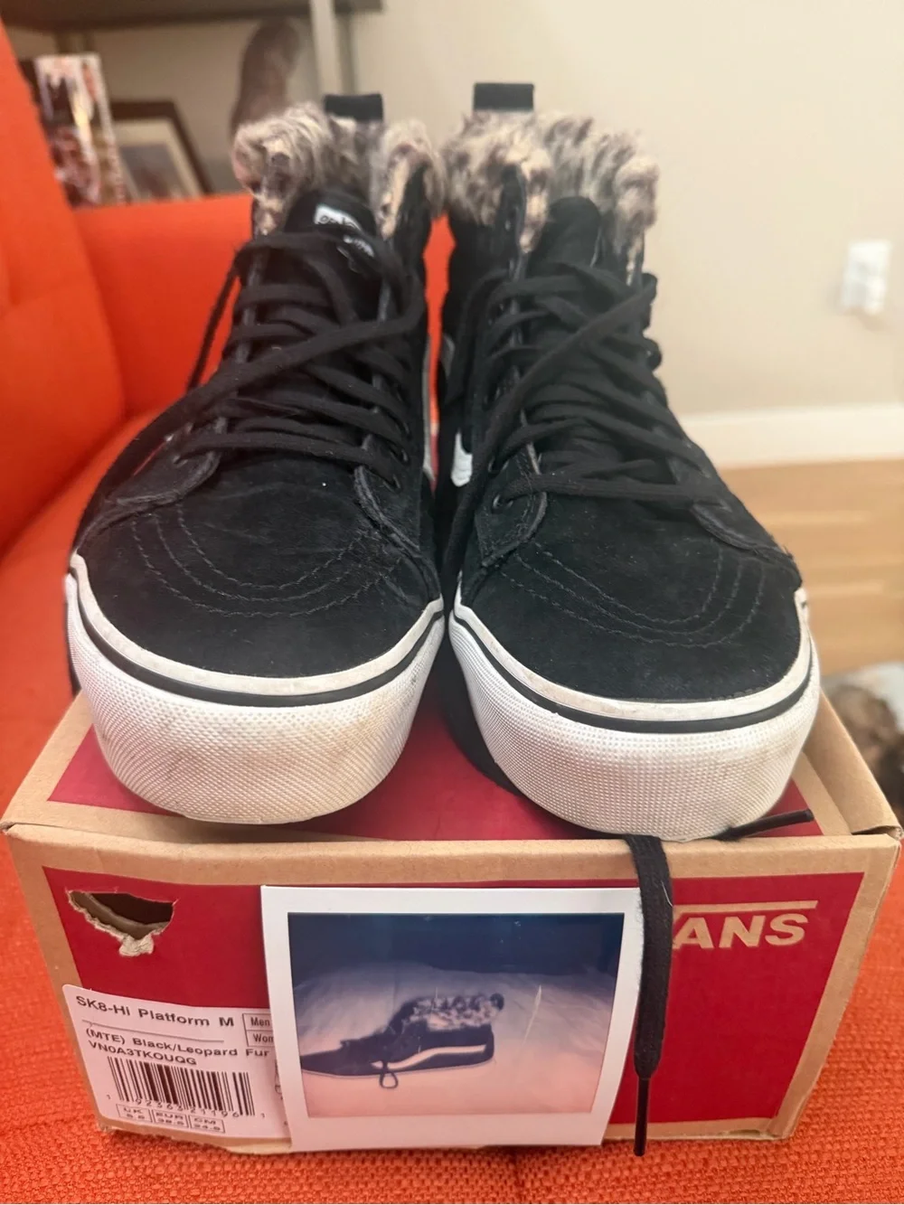 Vans Women's Black High-Top Sneakers with White Stripe and Faux Fur